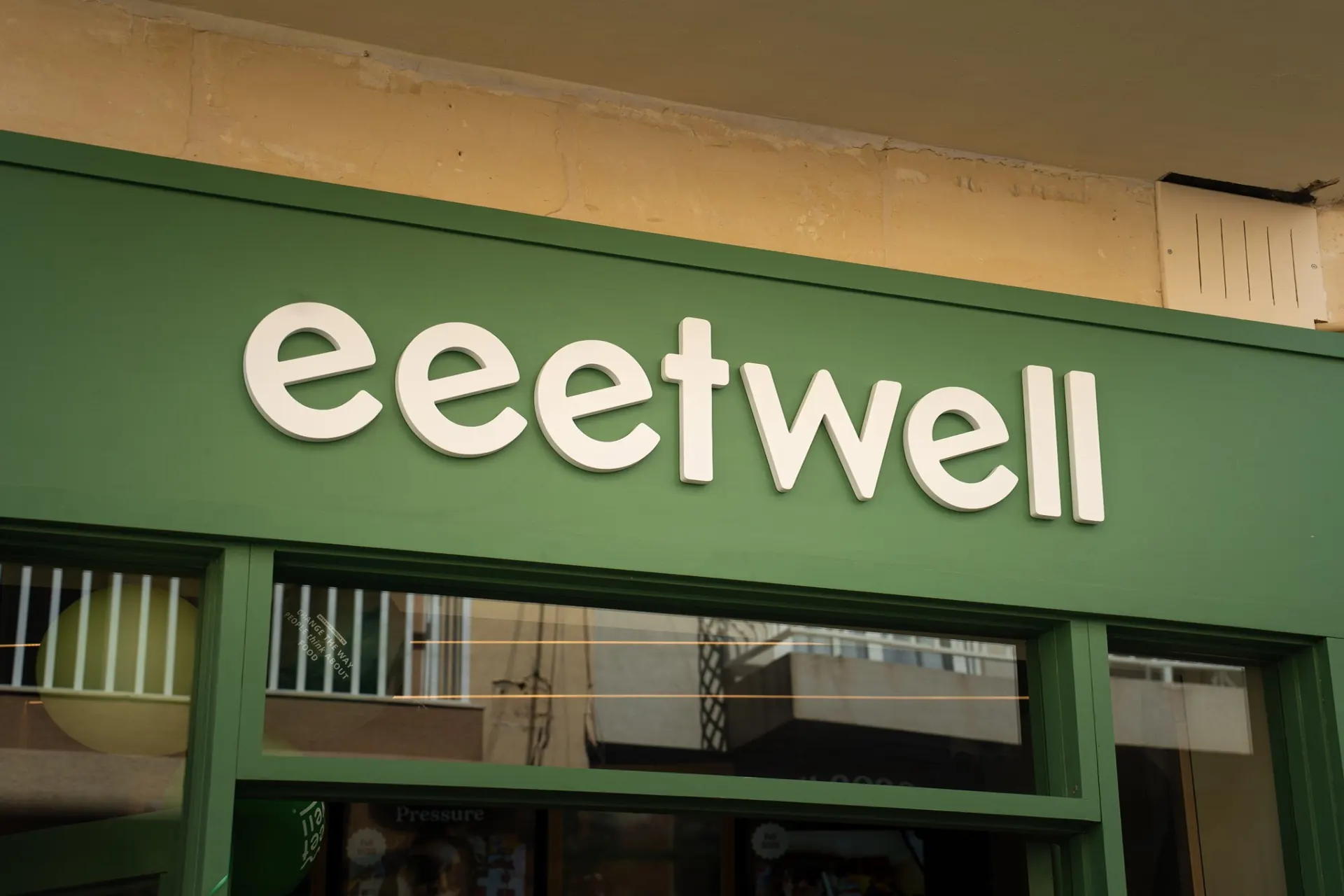 eeetwell shopfront sign
