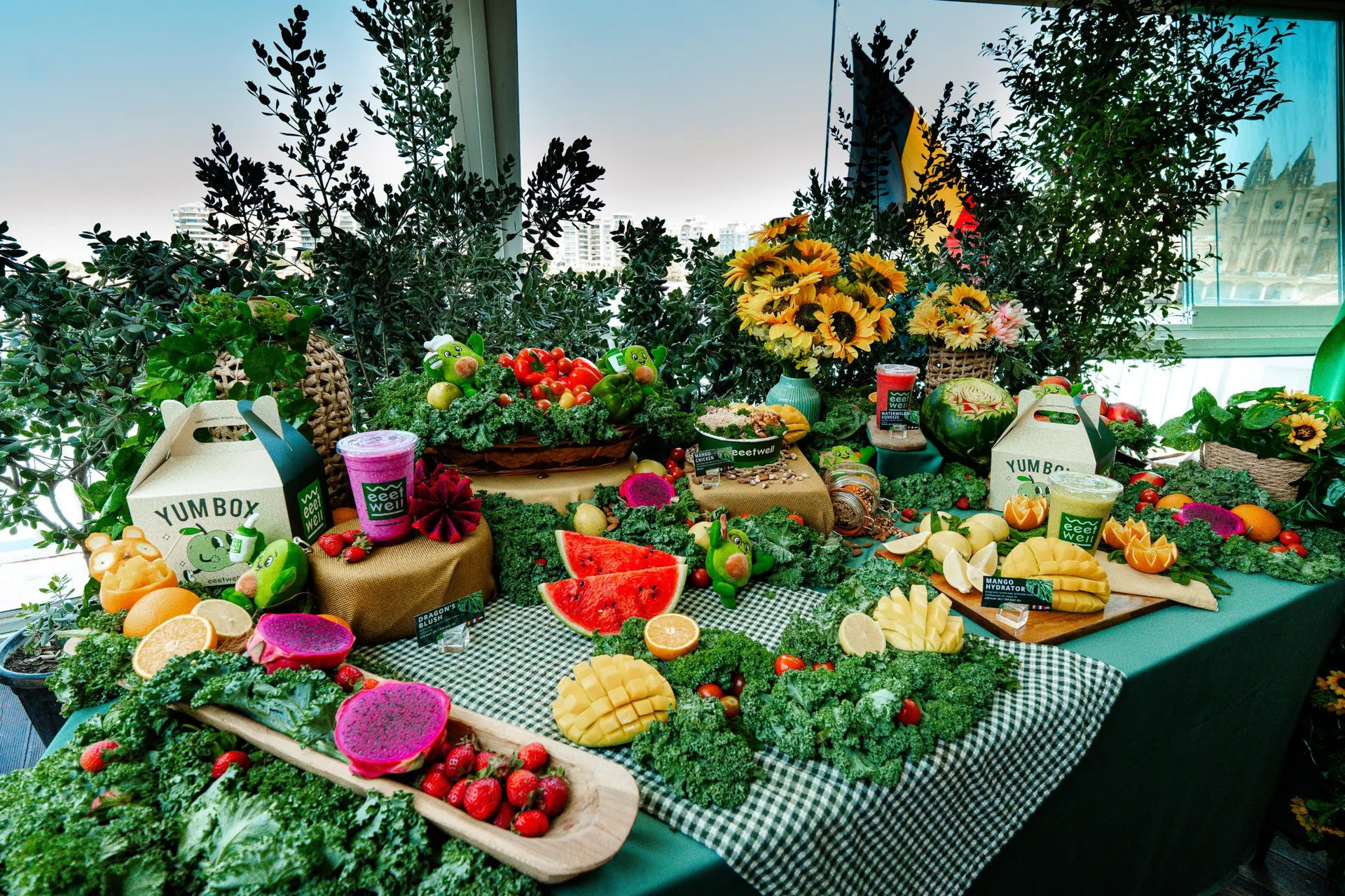 Summer fruit display with watermelon, mango and dragon fruit at an eeetwell event